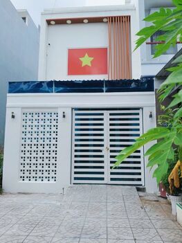 BÁN NHÀ 1T1Lửng, MẶT TIỀN - KDC Bình Nhựt (12Ha8). Đối  diện cổng TRƯỜNG HỌC