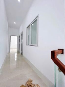 BÁN NHÀ 1T1Lửng, MẶT TIỀN - KDC Bình Nhựt (12Ha8). Đối  diện cổng TRƯỜNG HỌC