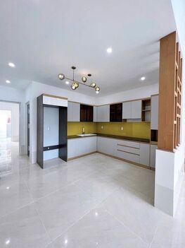 BÁN NHÀ 1T1Lửng, MẶT TIỀN - KDC Bình Nhựt (12Ha8). Đối  diện cổng TRƯỜNG HỌC